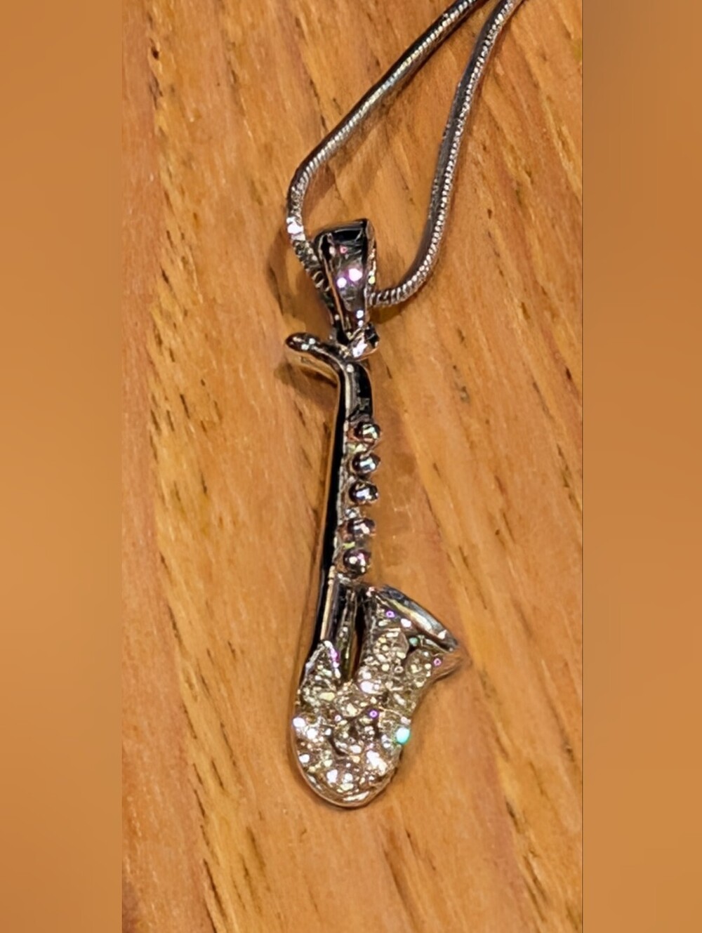 Source Unknown Silver Saxophone Pendant Necklace with Clear Crystals